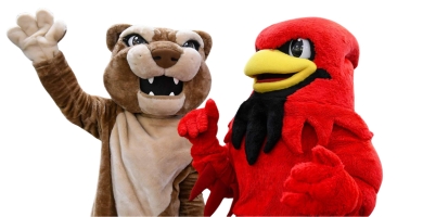 Calvin Cougar mascot with Burghy mascot